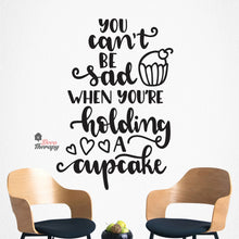 Load image into Gallery viewer, You Can&#39;t Be Sad When You&#39;re Holding Cupcake Wall Decal Decotherapy